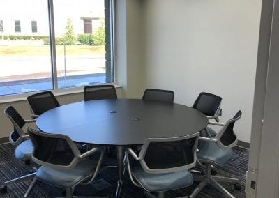 Construction Clean with Round Table Conference Room-min